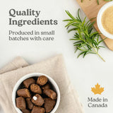 Bowl of brown pill-hiding dog treats with rosemary sprig