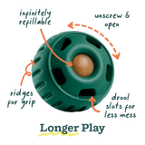 Green round dog toy with textured ring, holes, and a center ball for chewing